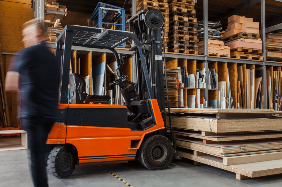 Photo of a fork lift truck in a warehouse